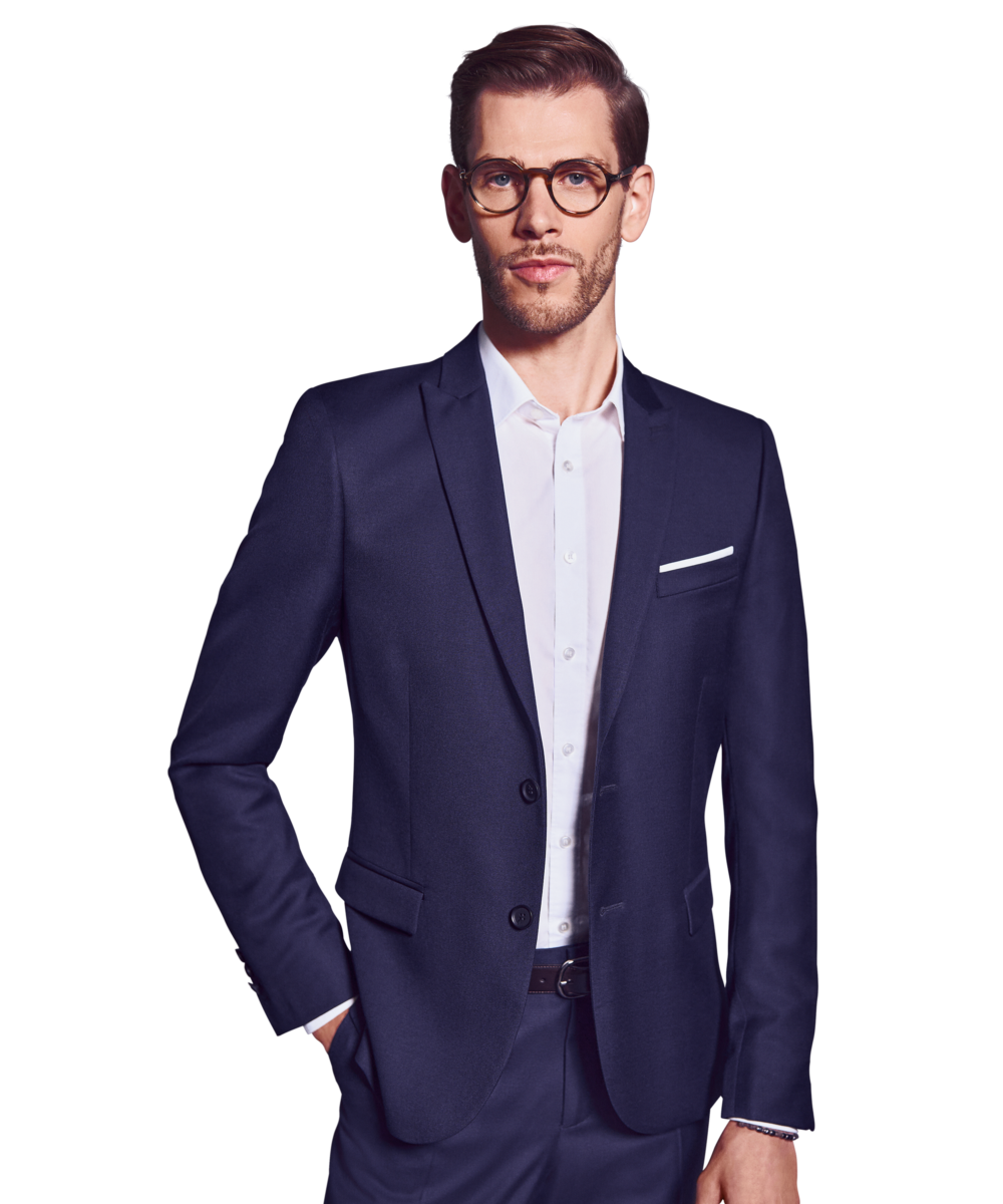 Portraitbild von Jonathan Isele, Partner bei Kemény Boehme Consultants, der mit neutralem Gesichtsausdruck und der rechten Hand in der Hosentasche in die Kamera blickt