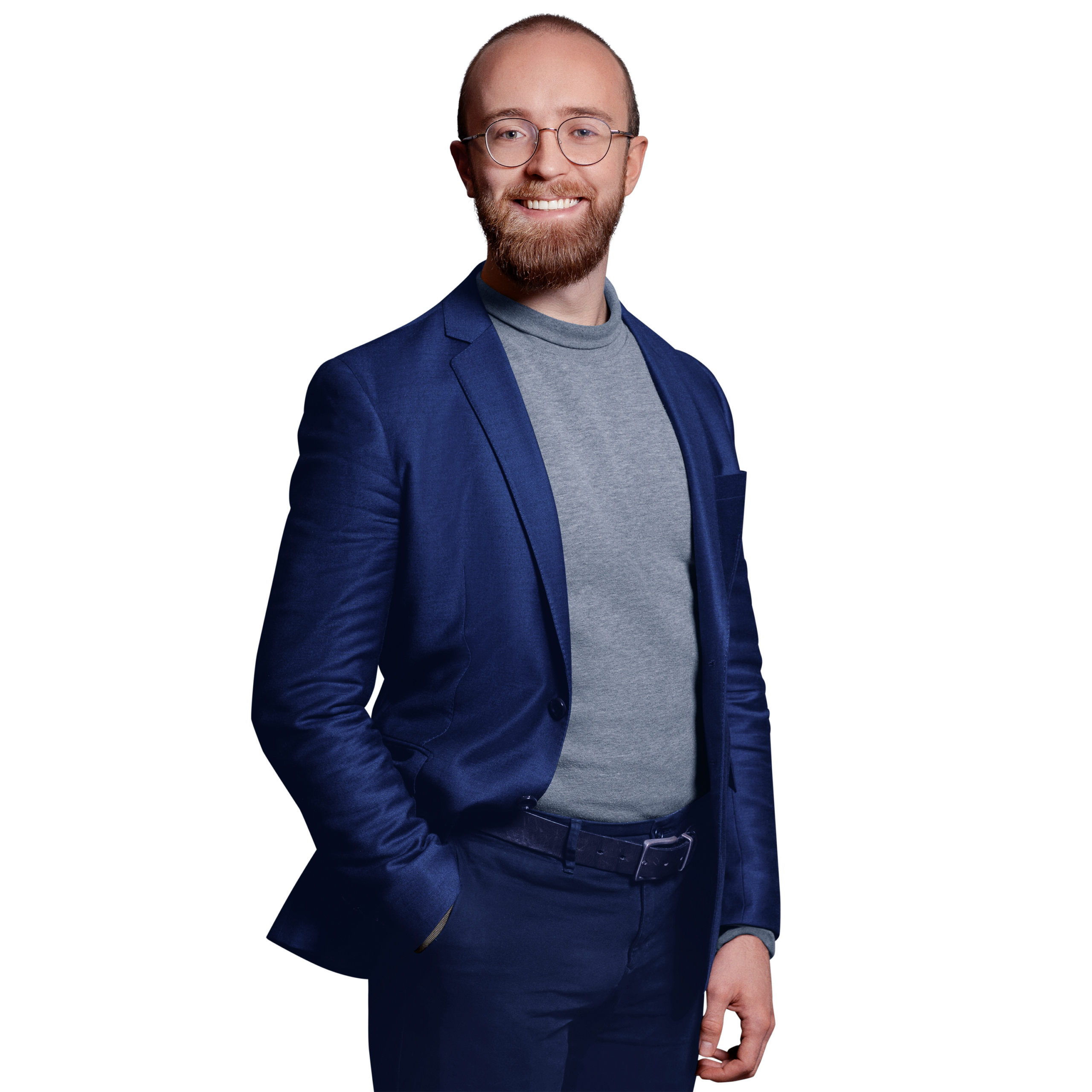 Portraitbild von Alexander Lackerschmid, Senior Software Engineer bei Kemény Boehme Consultants, der mit neutralem Gesichtsausdruck und der rechten Hand in der Hosentasche in die Kamera blickt